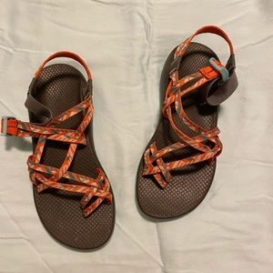 Orange and brown Chacos